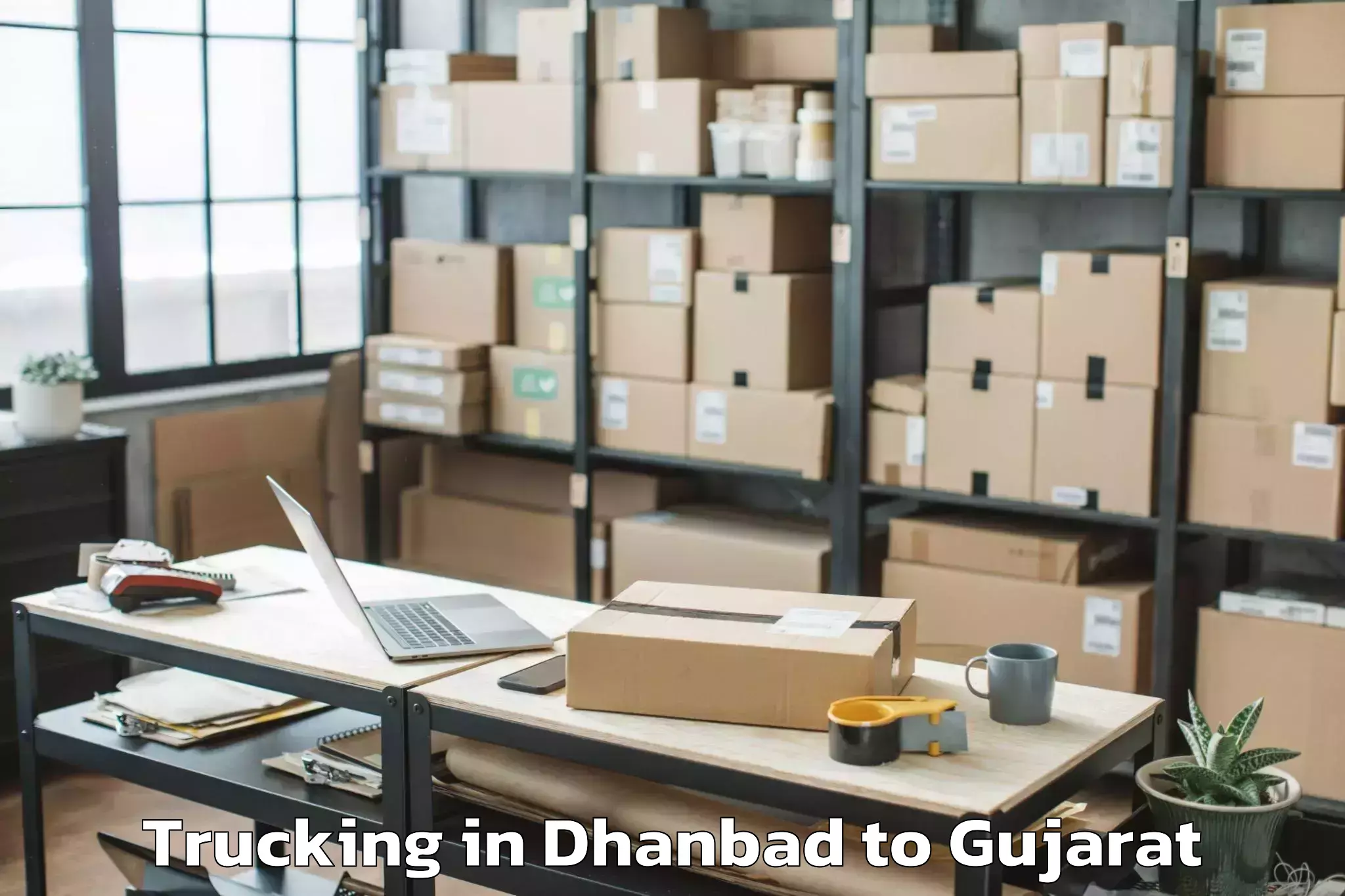 Get Dhanbad to Umarpada Trucking